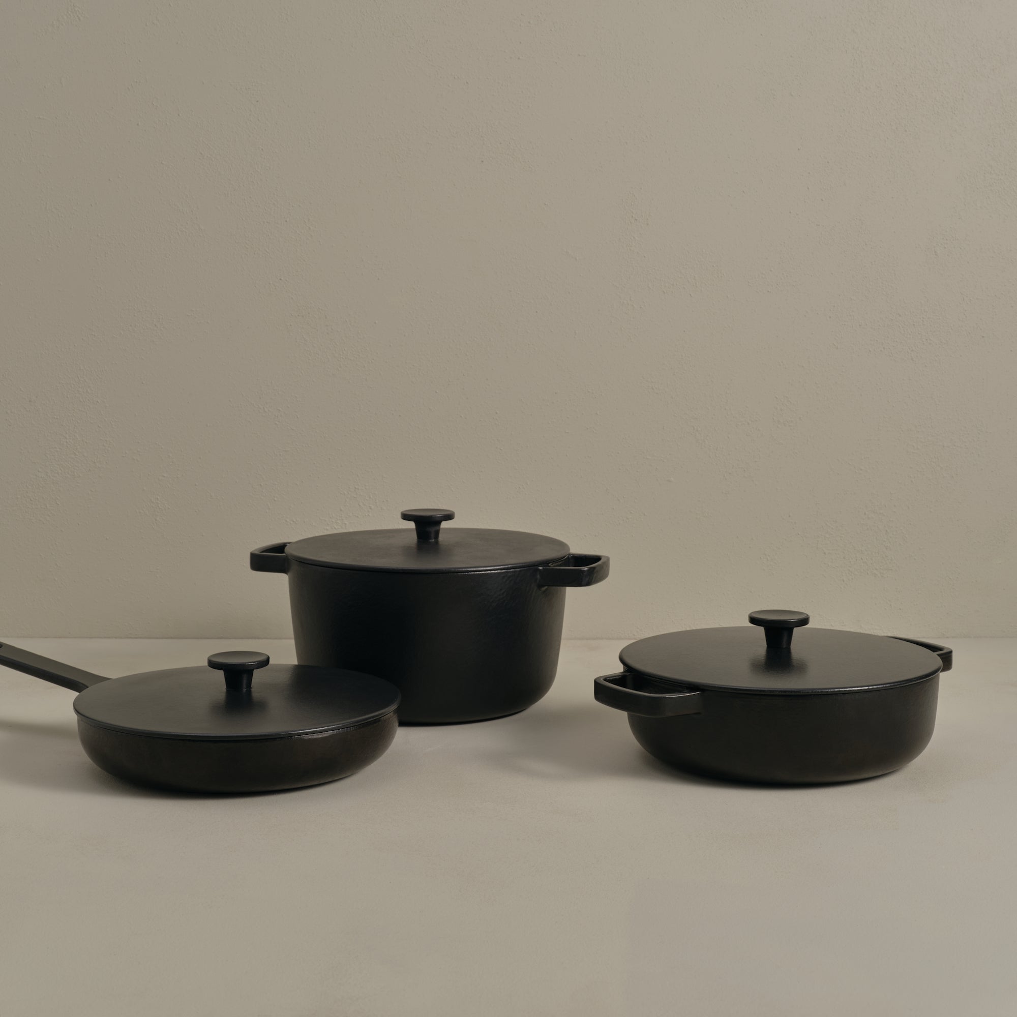 Katto cast iron set of pans featuring a stockpot, sauté pan and skillet pan all with lids