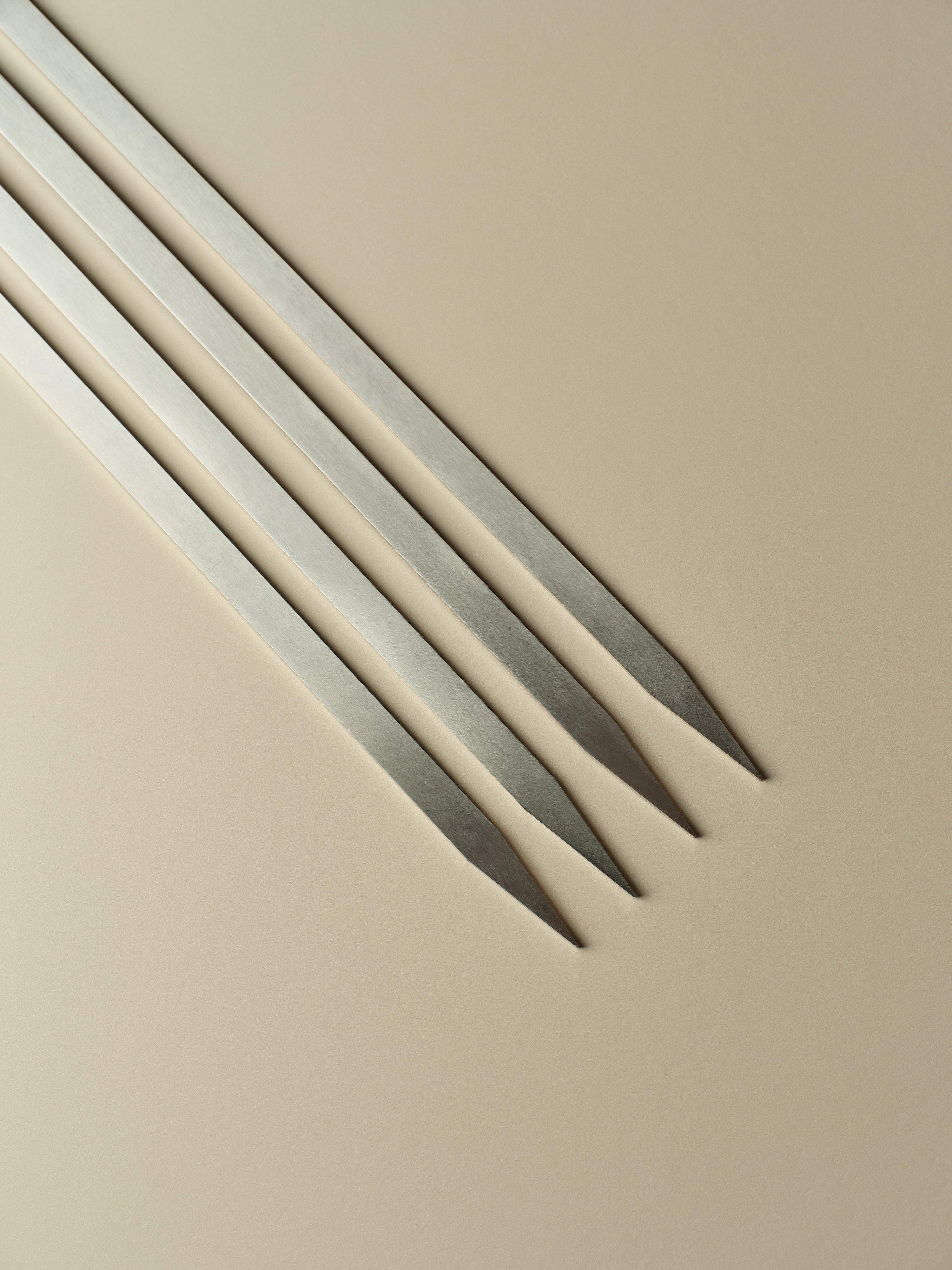 Four slat skewer points