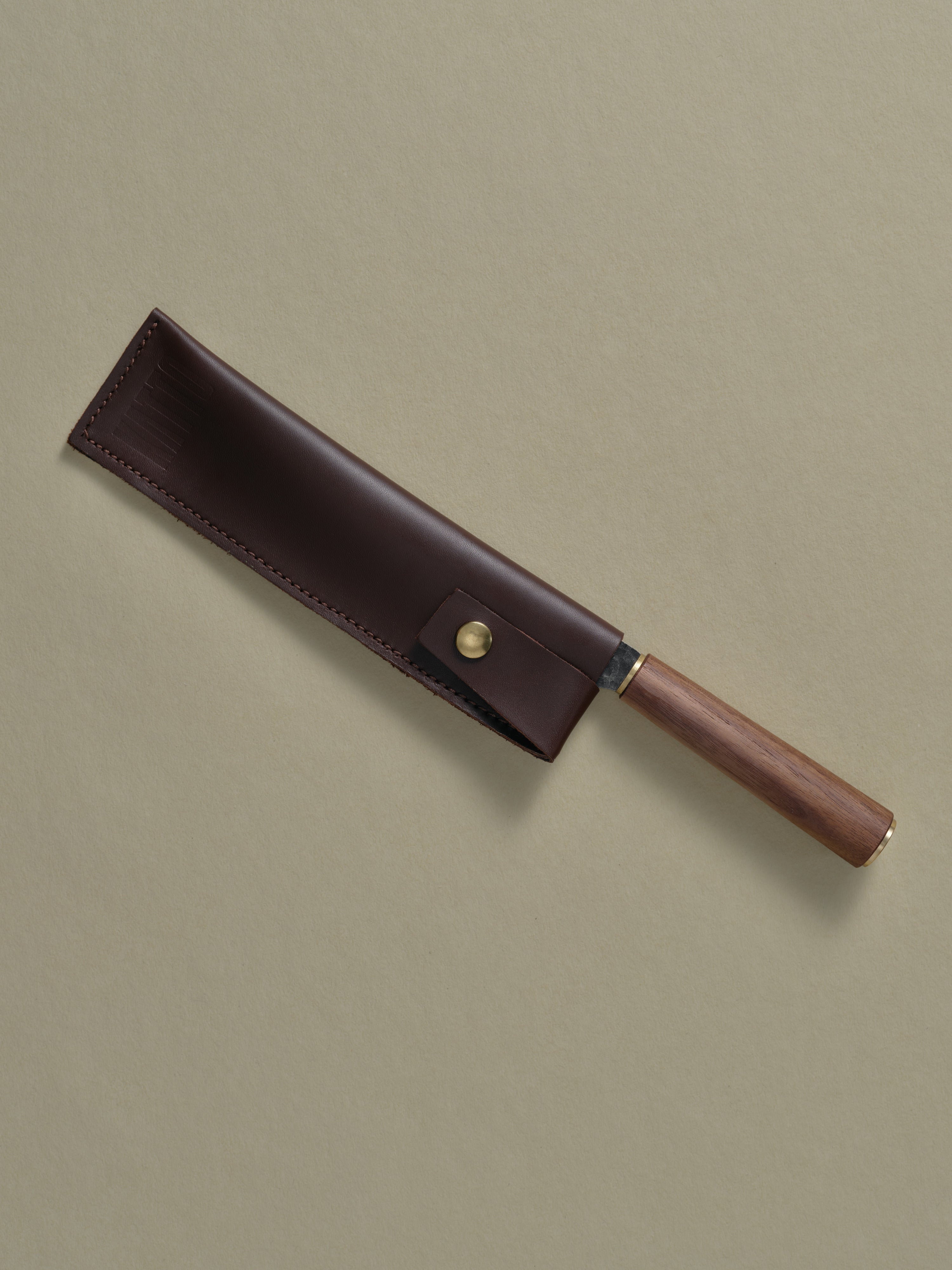 Katto Knife fastened inside a Leather Scabbard